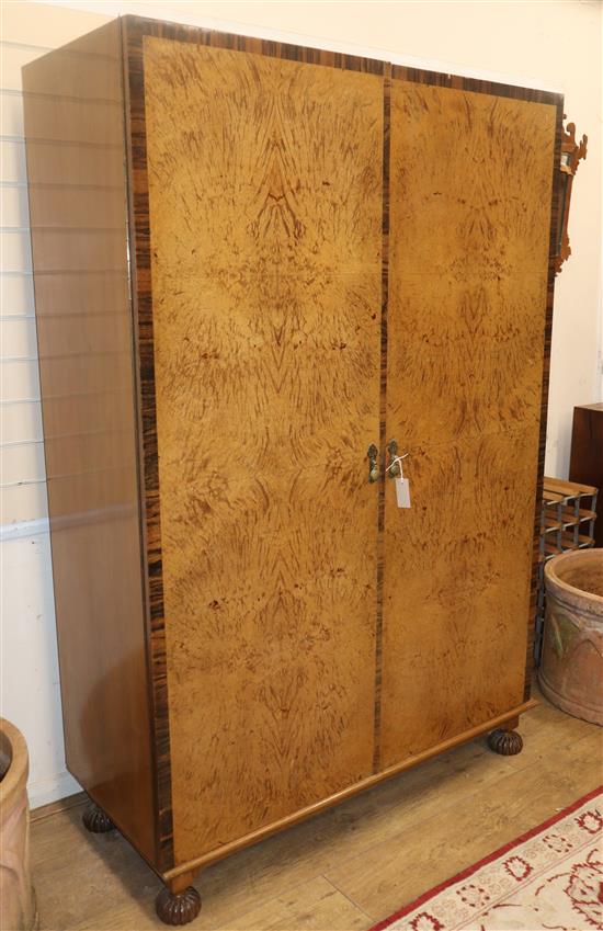 An Art Deco maple wardrobe W.122cm